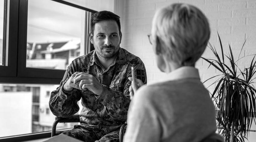 An army veteran consulting with a physician