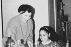 Arielle Sheftall, PhD, on her 8th birthday with her mother.