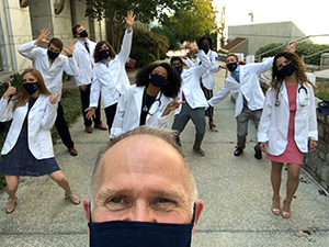 Donald Batisky, MD, takes a selfie with his group of advisees from Emory University College of Medicine after their White Coat Ceremony in 2020.