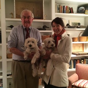John T. Dammin, MD, left, UVA School of Medicine alumnus, poses with Lexie Wang, MD, when she was in Boston, Mass., for the 2015–2016 interview season. HOST students often say they love homey visits with pups and kids.
