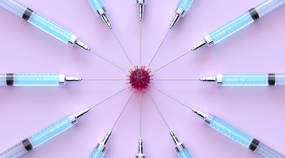 A circle of syringes surrounds a SARS-CoV-2 molecule