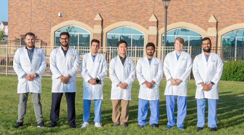 At the University of North Dakota School of Medicine & Health Sciences, roughly 50% of internal medicine residents are non-U.S. IMGs. Of the eight residents pictured above, four are international students. 