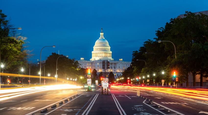The United States Capitol building at night in Washington DC, USA